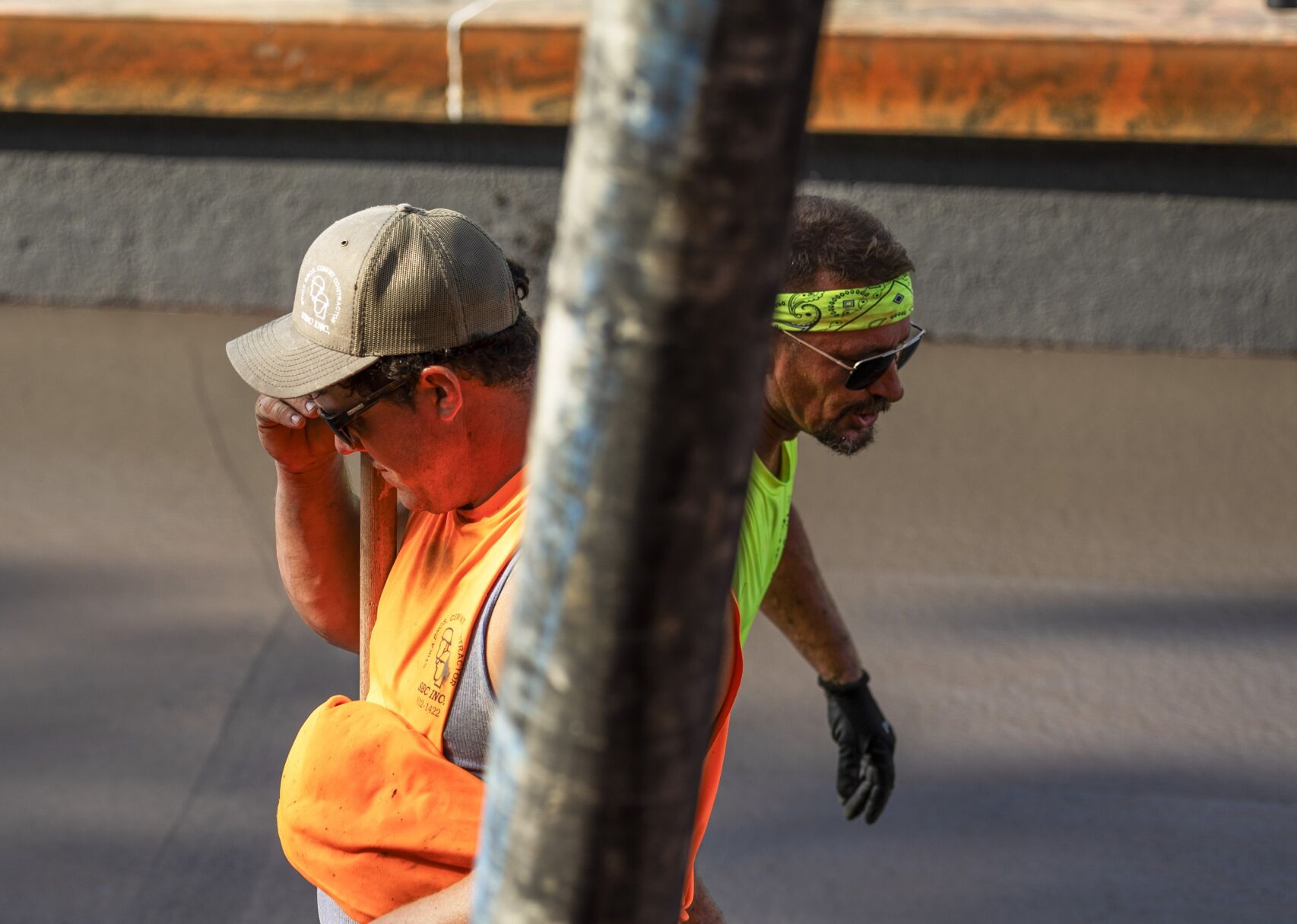 Cement contractors repair city fountain